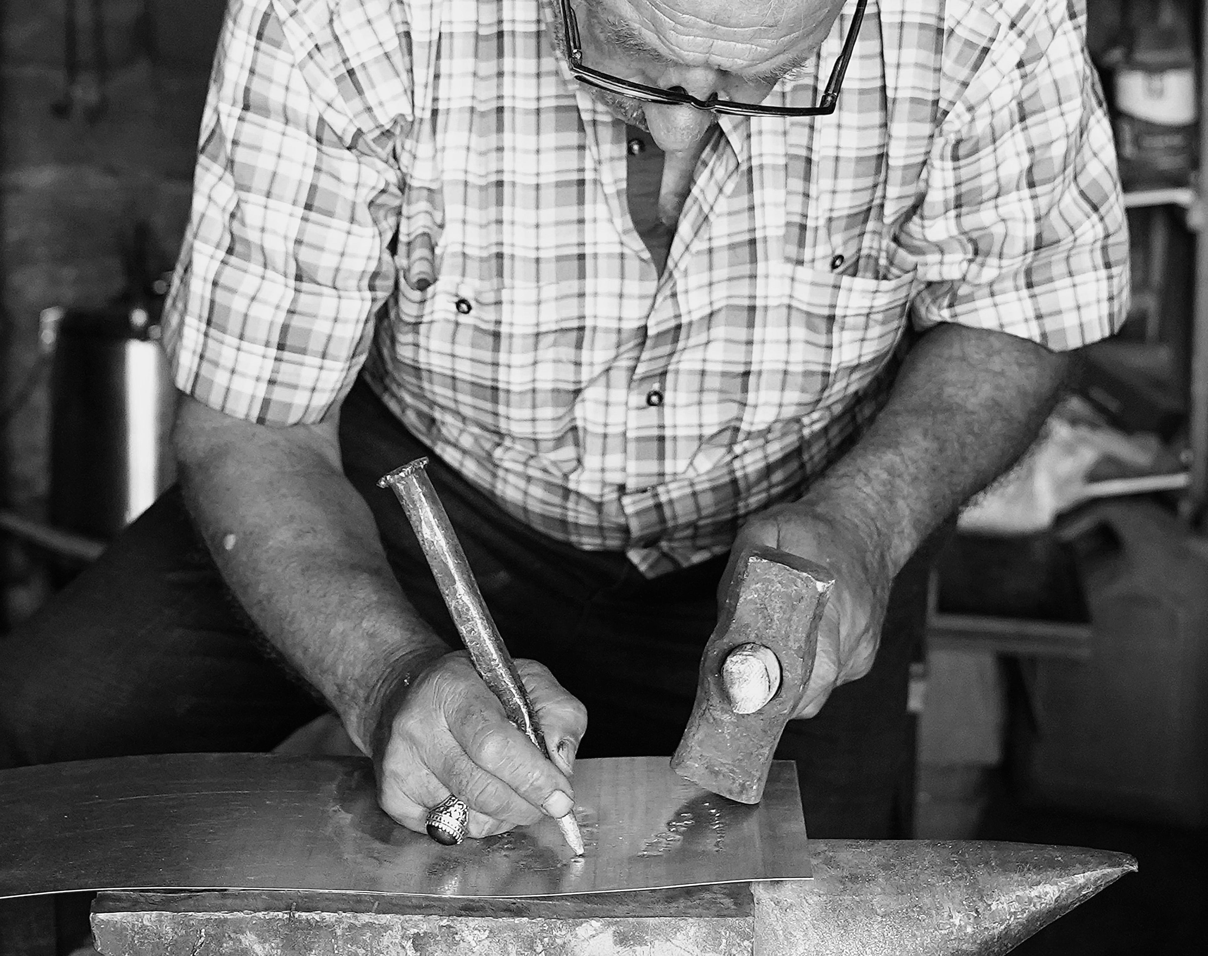 A master silversmith at work in his Grand Bazaar atelier, Istanbul.