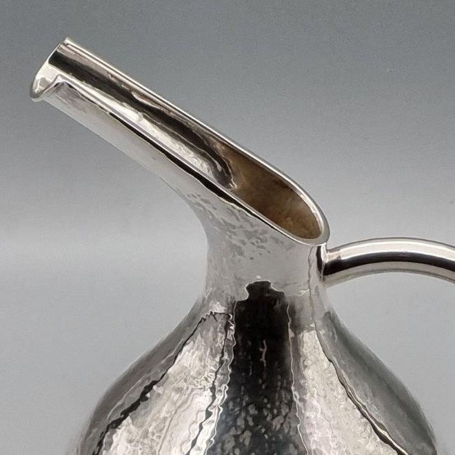 Silver-plated ceremonial ewer with elongated spout, handcrafted in Istanbul's Grand Bazaar