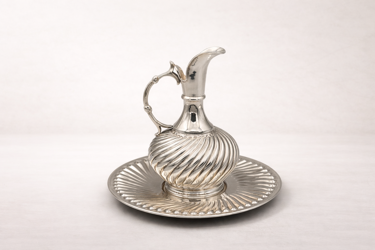 Silver-plated Bektashi pitcher with matching engraved tray, handcrafted in Istanbul's Grand Bazaar
