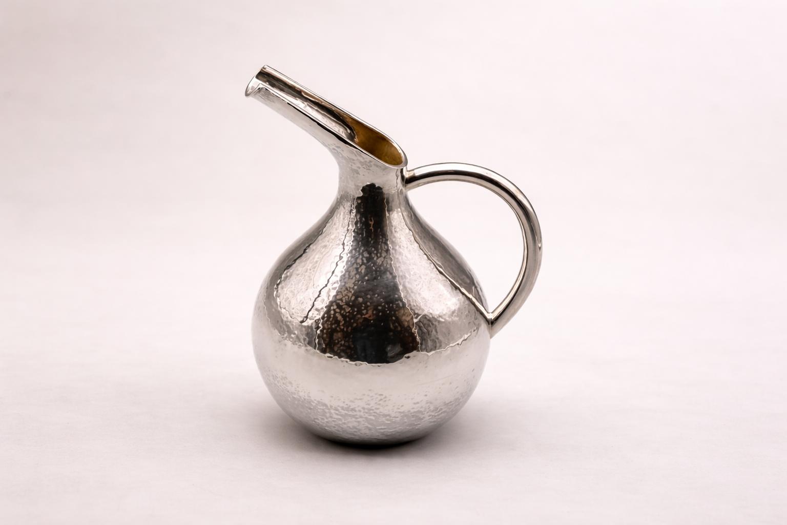 Silver-plated ceremonial ewer with elongated spout, handcrafted in Istanbul's Grand Bazaar