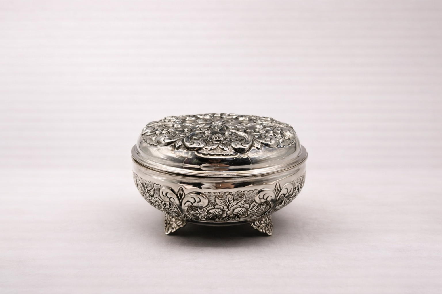Silver-plated bonbonniere on tripod base with heritage relief detailing, handcrafted in Istanbul's Grand Bazaar