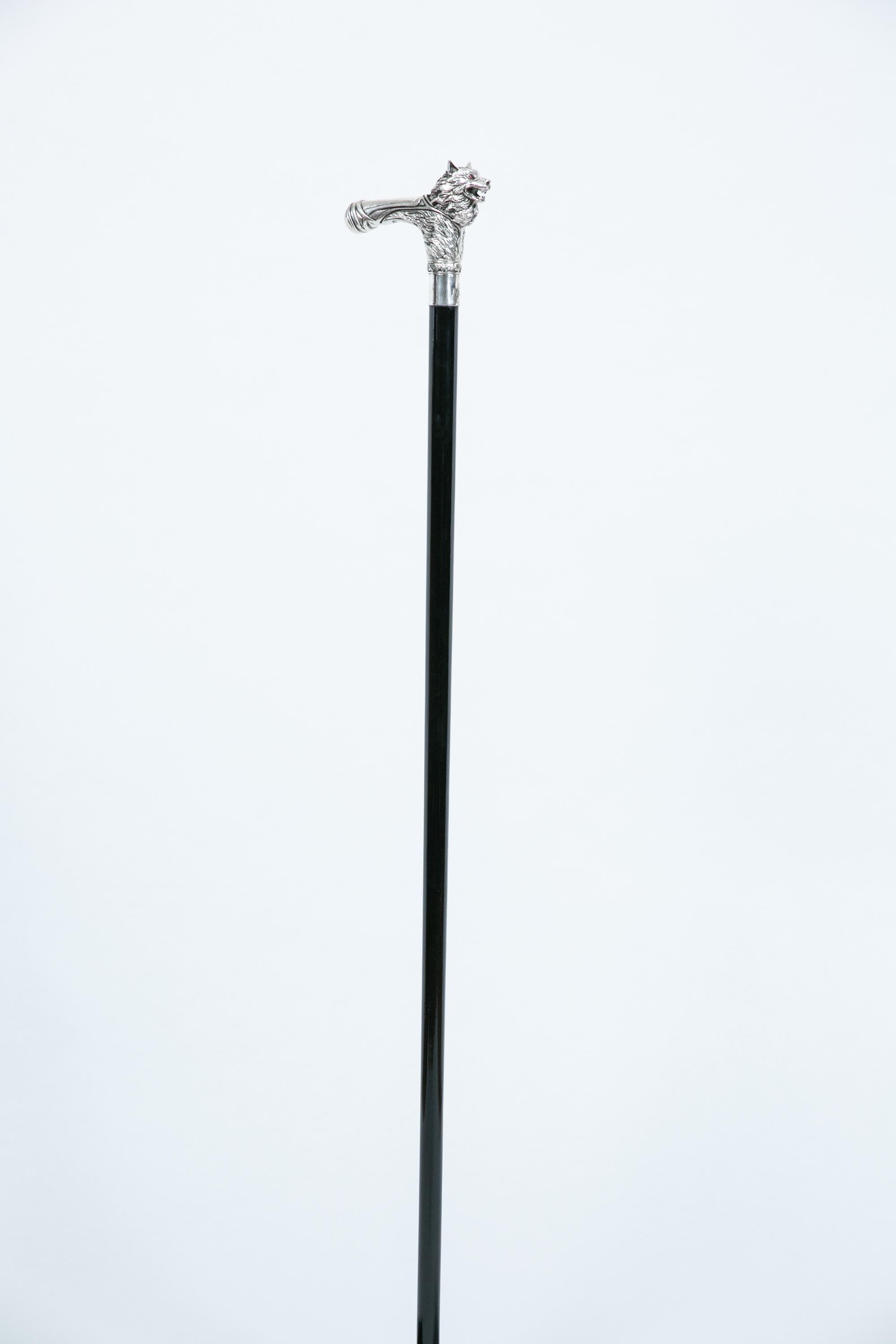 Silver-plated walking cane with sculpted wolf head handle, handcrafted in Istanbul's Grand Bazaar