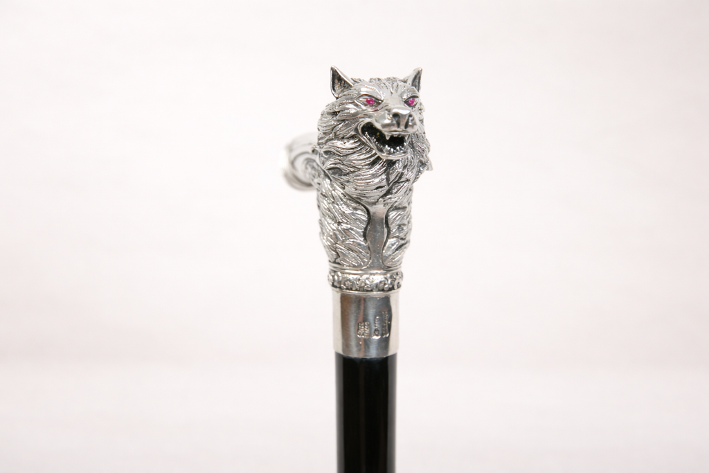 Silver-plated walking cane with sculpted wolf head handle, handcrafted in Istanbul's Grand Bazaar