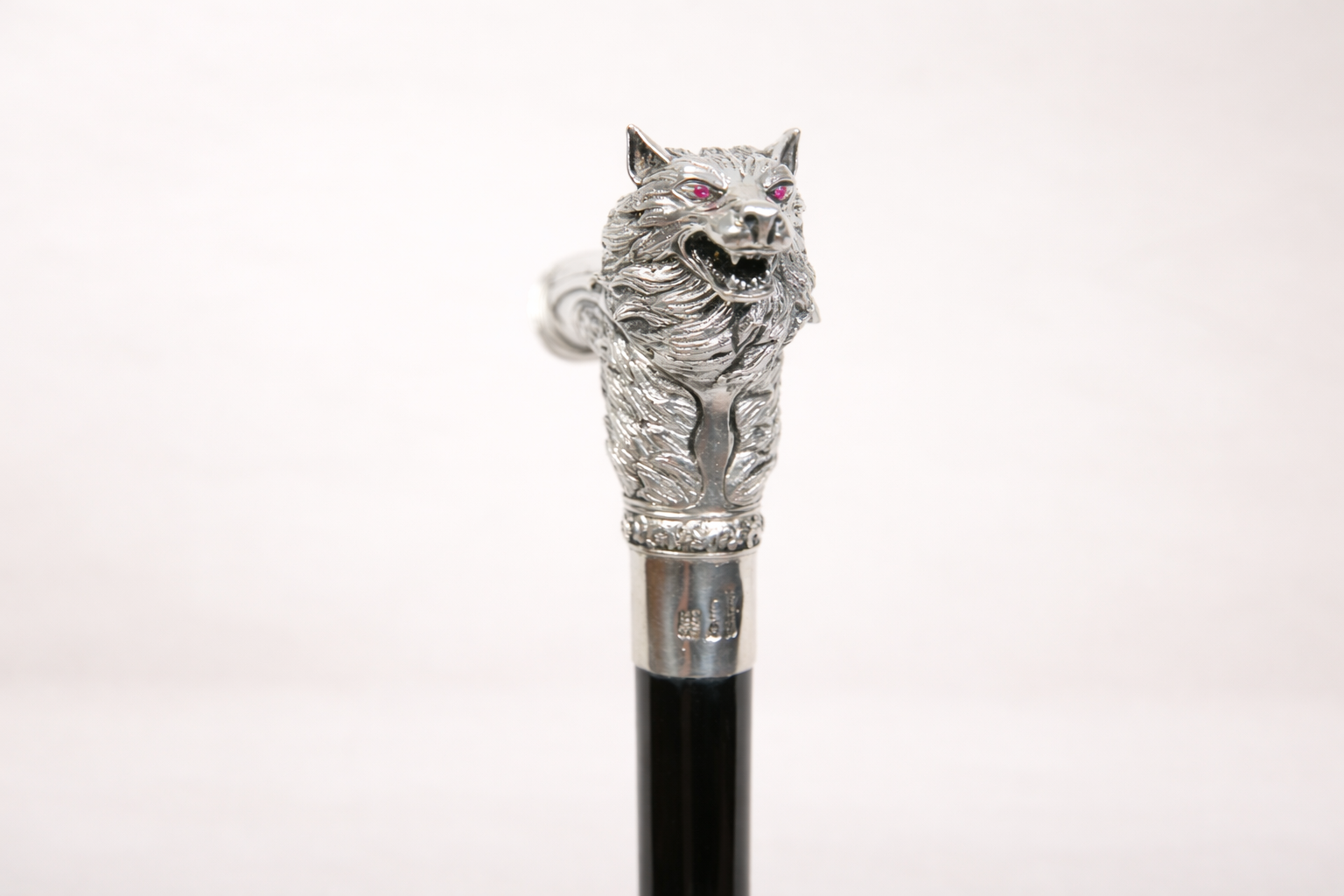 Silver-plated walking cane with sculpted wolf head handle, handcrafted in Istanbul's Grand Bazaar