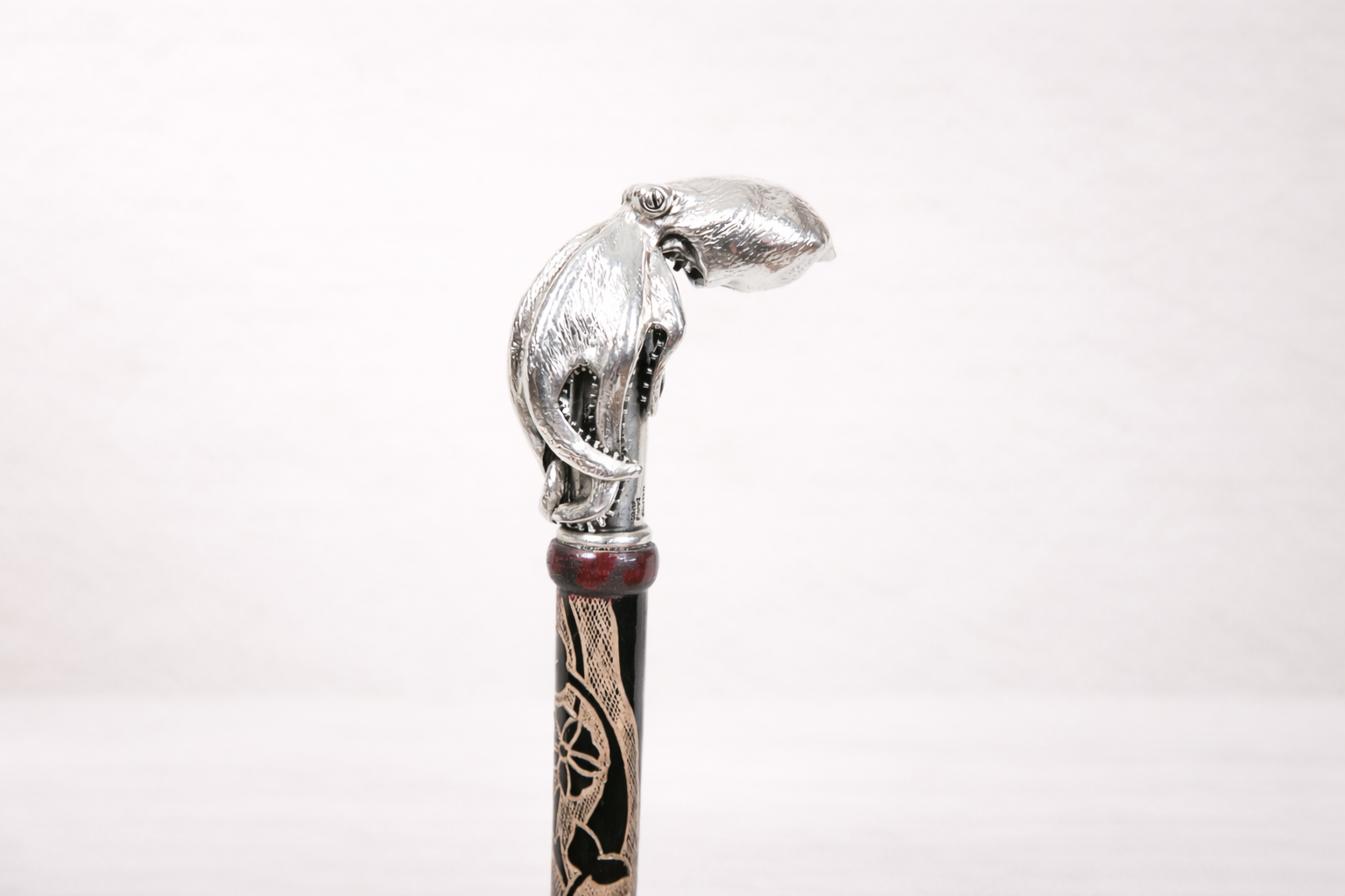 Silver-plated walking cane with sculpted octopus head handle, handcrafted in Istanbul's Grand Bazaar