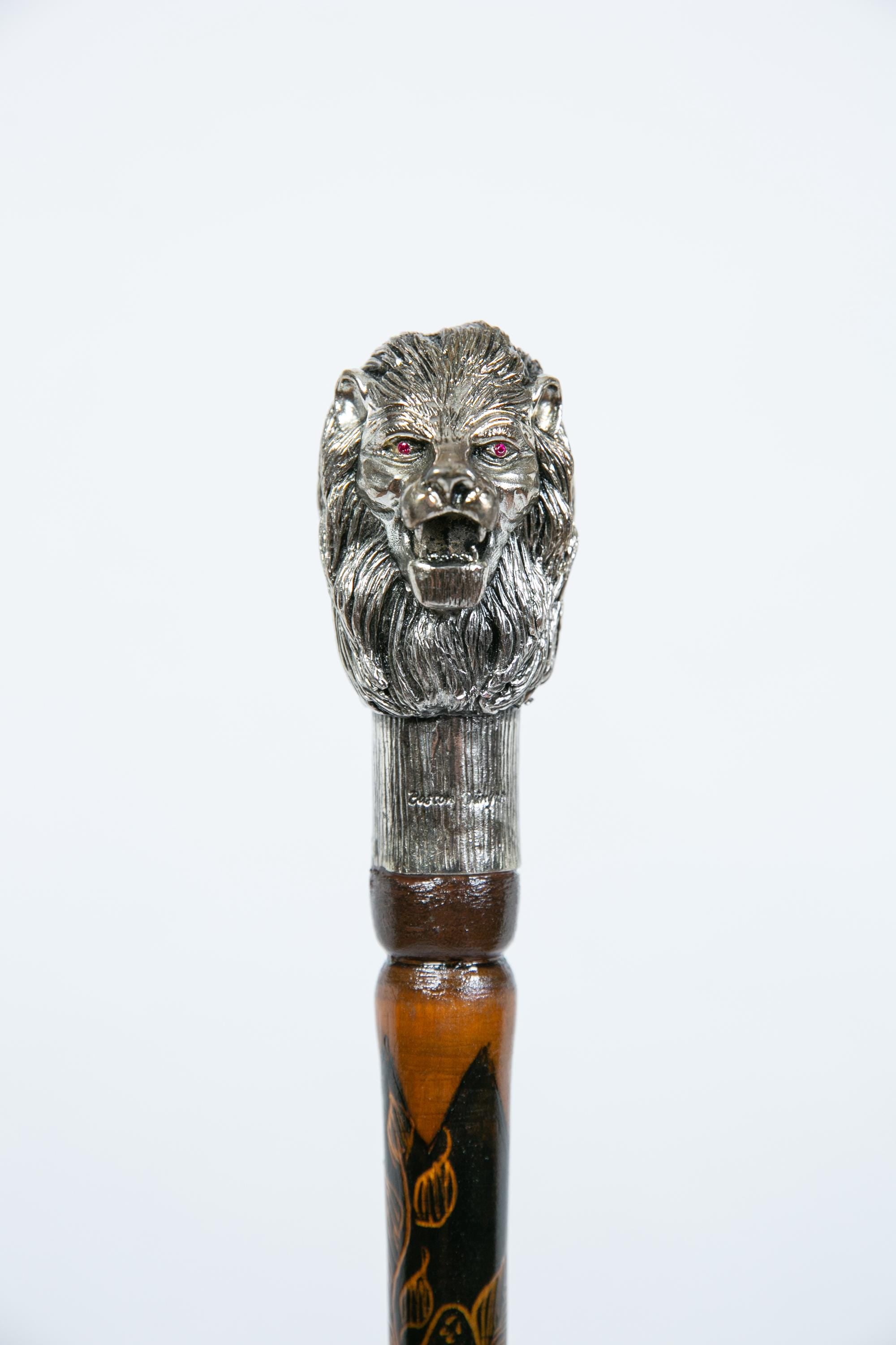 Silver-plated walking cane with sculpted lion head handle, handcrafted in Istanbul's Grand Bazaar