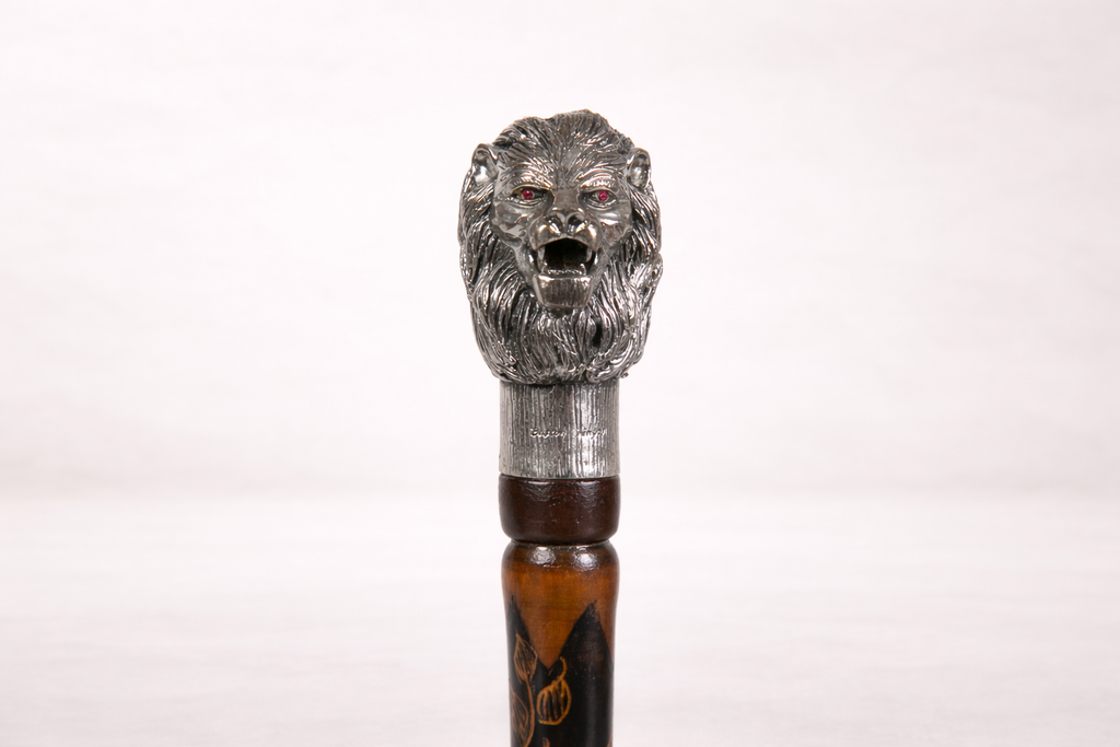 Silver-plated walking cane with sculpted lion head handle, handcrafted in Istanbul's Grand Bazaar