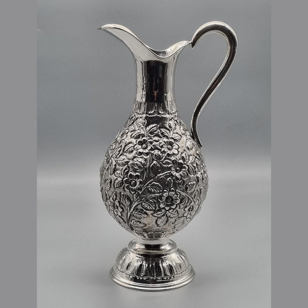Silver-plated pitcher with hand-engraved floral artisan detailing, handcrafted in Istanbul's Grand Bazaar