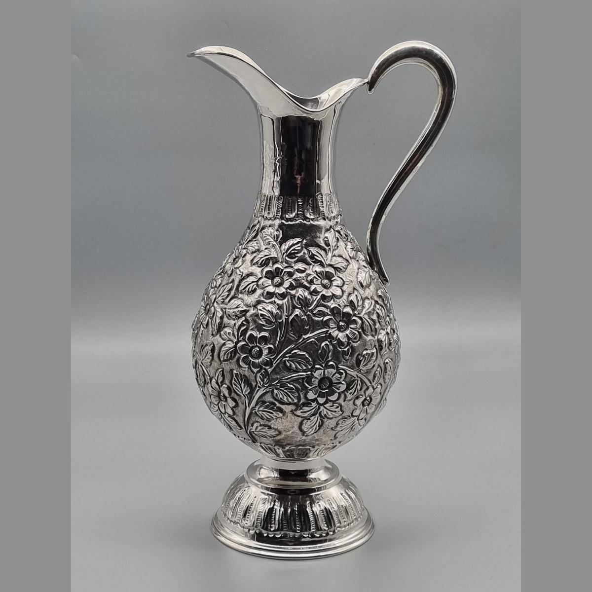 Silver-plated pitcher with hand-engraved floral artisan detailing, handcrafted in Istanbul's Grand Bazaar