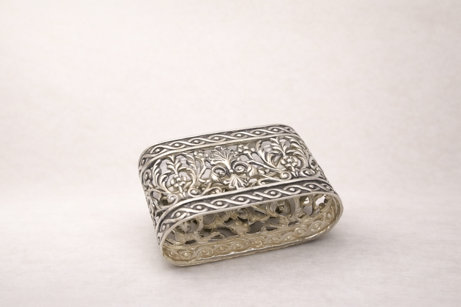 Silver-plated Ottoman napkin ring with engraved relief detailing, handcrafted in Istanbul's Grand Bazaar