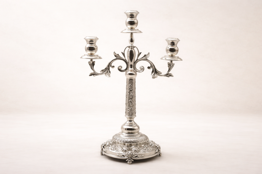 Silver-plated brass triple-arm candelabra with ornate floral relief base, hand-finished in Istanbul