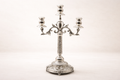 Silver-plated brass triple-arm candelabra with ornate floral relief base, hand-finished in Istanbul