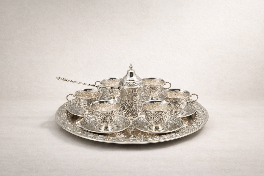 Solid 925 sterling silver Turkish coffee service for six with hand-engraved floral and scroll motifs, handcrafted in Istanbul's Grand Bazaar