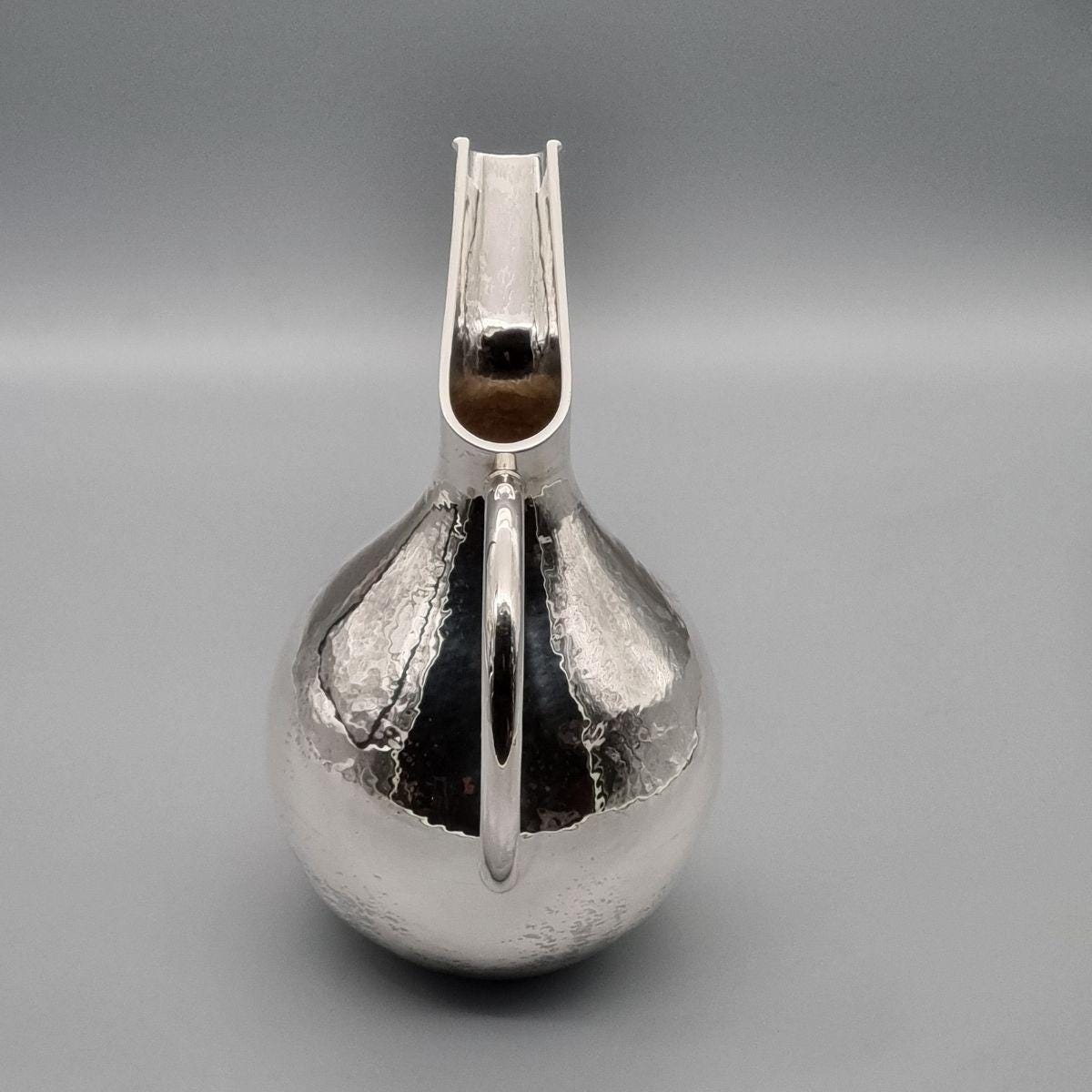 Silver-plated ceremonial ewer with elongated spout, handcrafted in Istanbul's Grand Bazaar