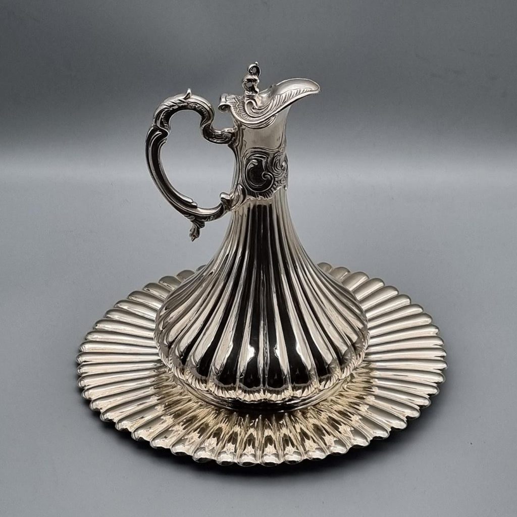 Solid silver ewer with rhythmic vertical fluting and wide scalloped tray, handcrafted in Istanbul's Grand Bazaar