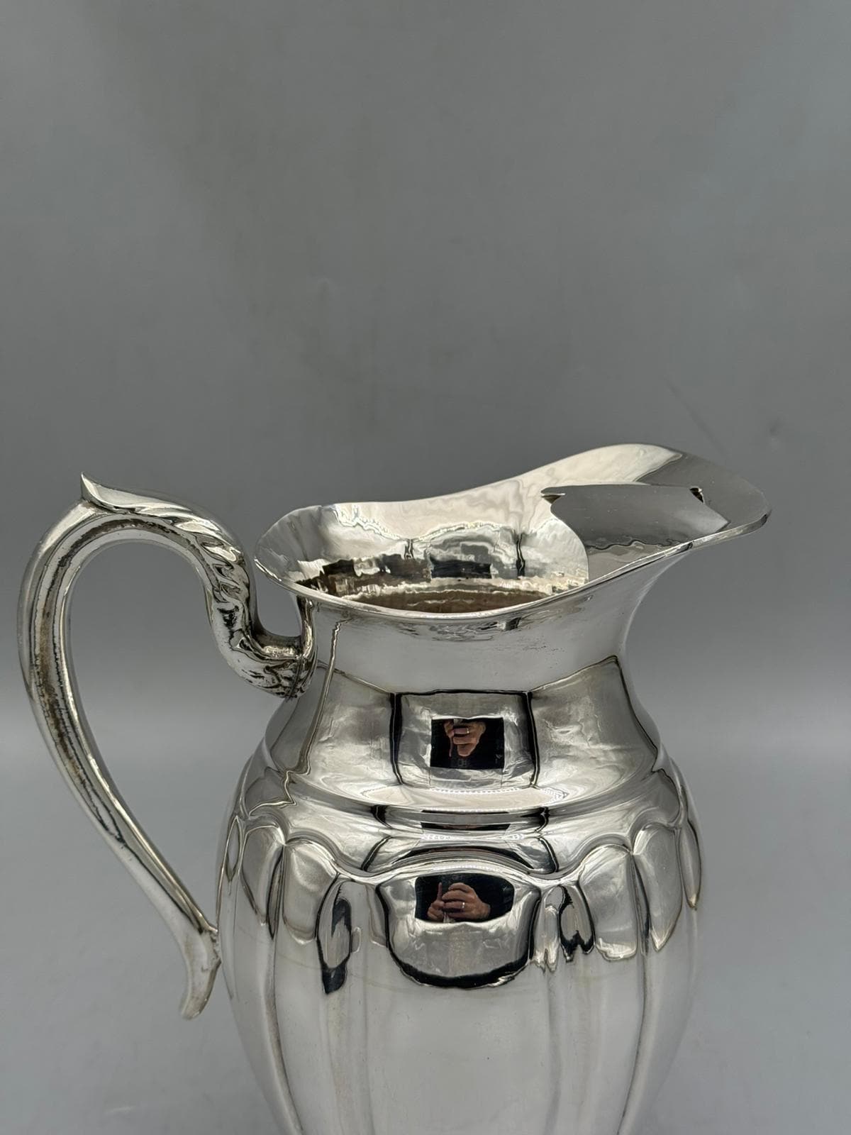 Silver-plated Ottoman pitcher with traditional relief detailing, handcrafted in Istanbul's Grand Bazaar
