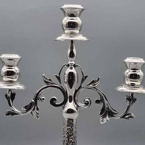 Silver-plated brass triple-arm candelabra with ornate floral relief base, hand-finished in Istanbul