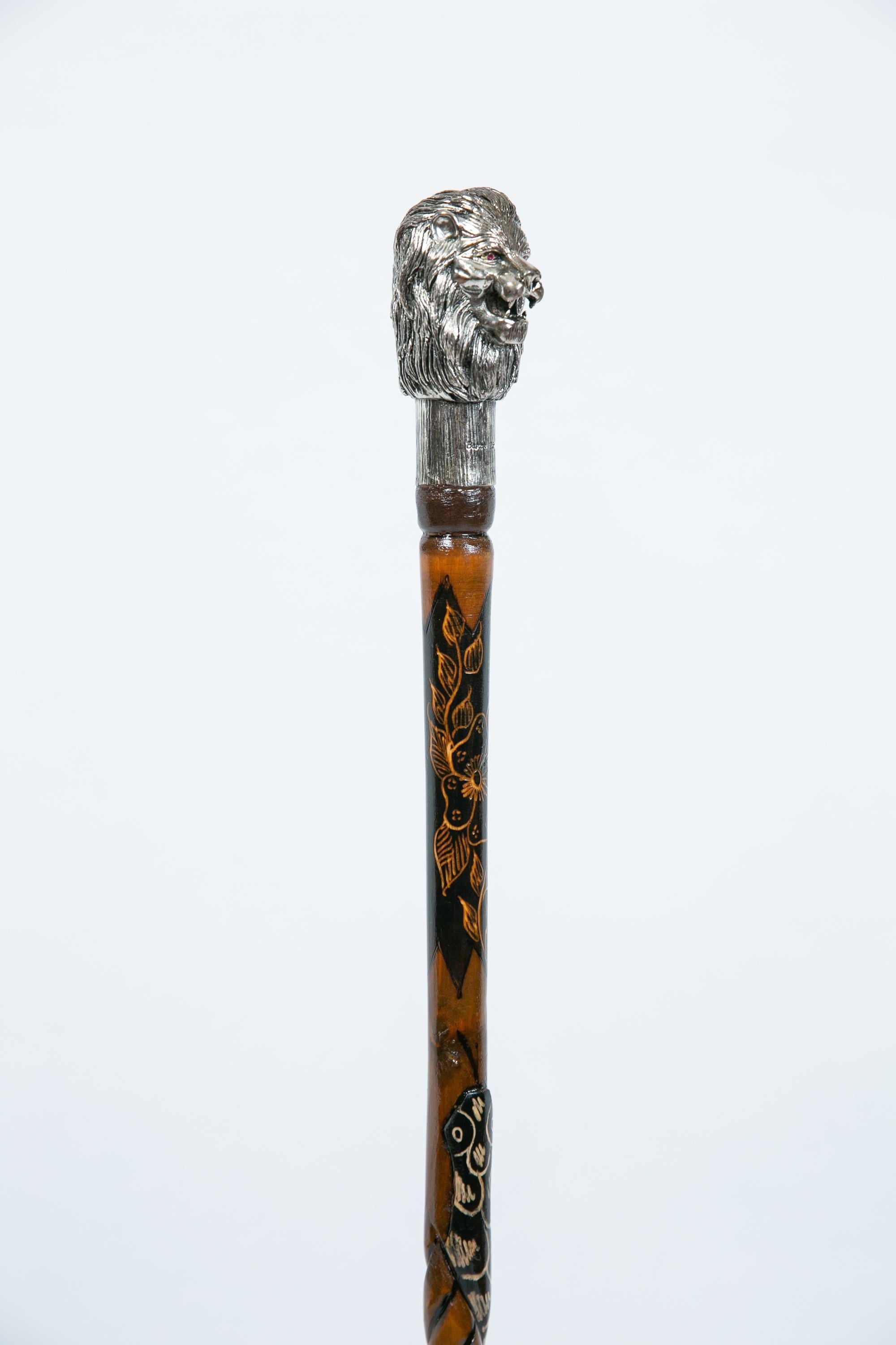 Silver-plated walking cane with sculpted lion head handle, handcrafted in Istanbul's Grand Bazaar