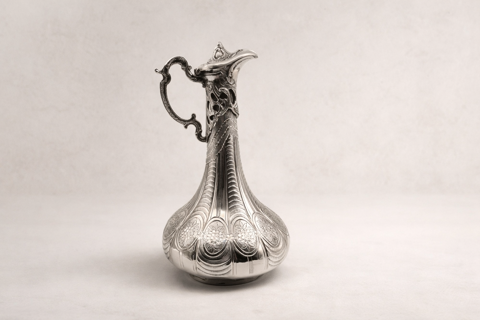 Solid 925 sterling silver ceremonial ewer with hand-engraved Ottoman floral panels, handcrafted in Istanbul's Grand Bazaar
