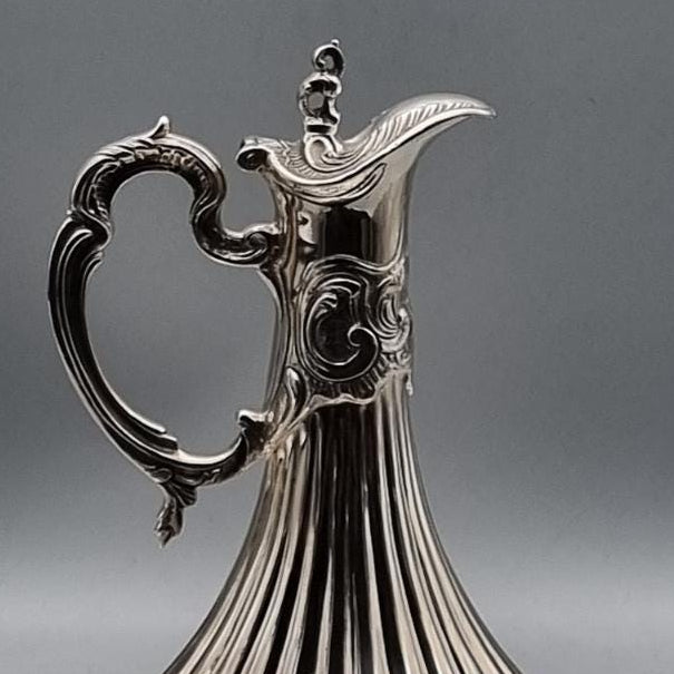 Solid silver ewer with rhythmic vertical fluting and wide scalloped tray, handcrafted in Istanbul's Grand Bazaar
