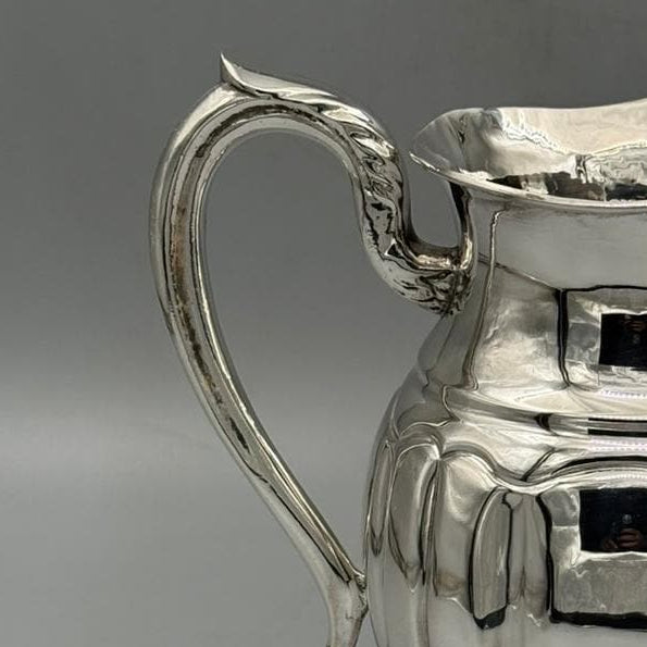 Silver-plated Ottoman pitcher with traditional relief detailing, handcrafted in Istanbul's Grand Bazaar