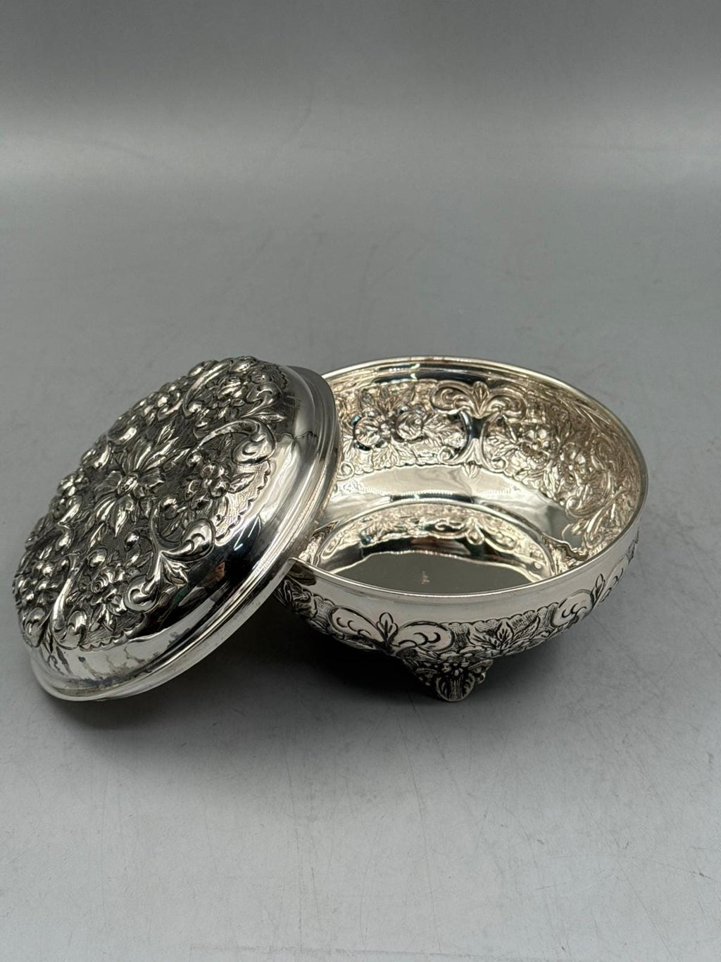Silver-plated bonbonniere on tripod base with heritage relief detailing, handcrafted in Istanbul's Grand Bazaar