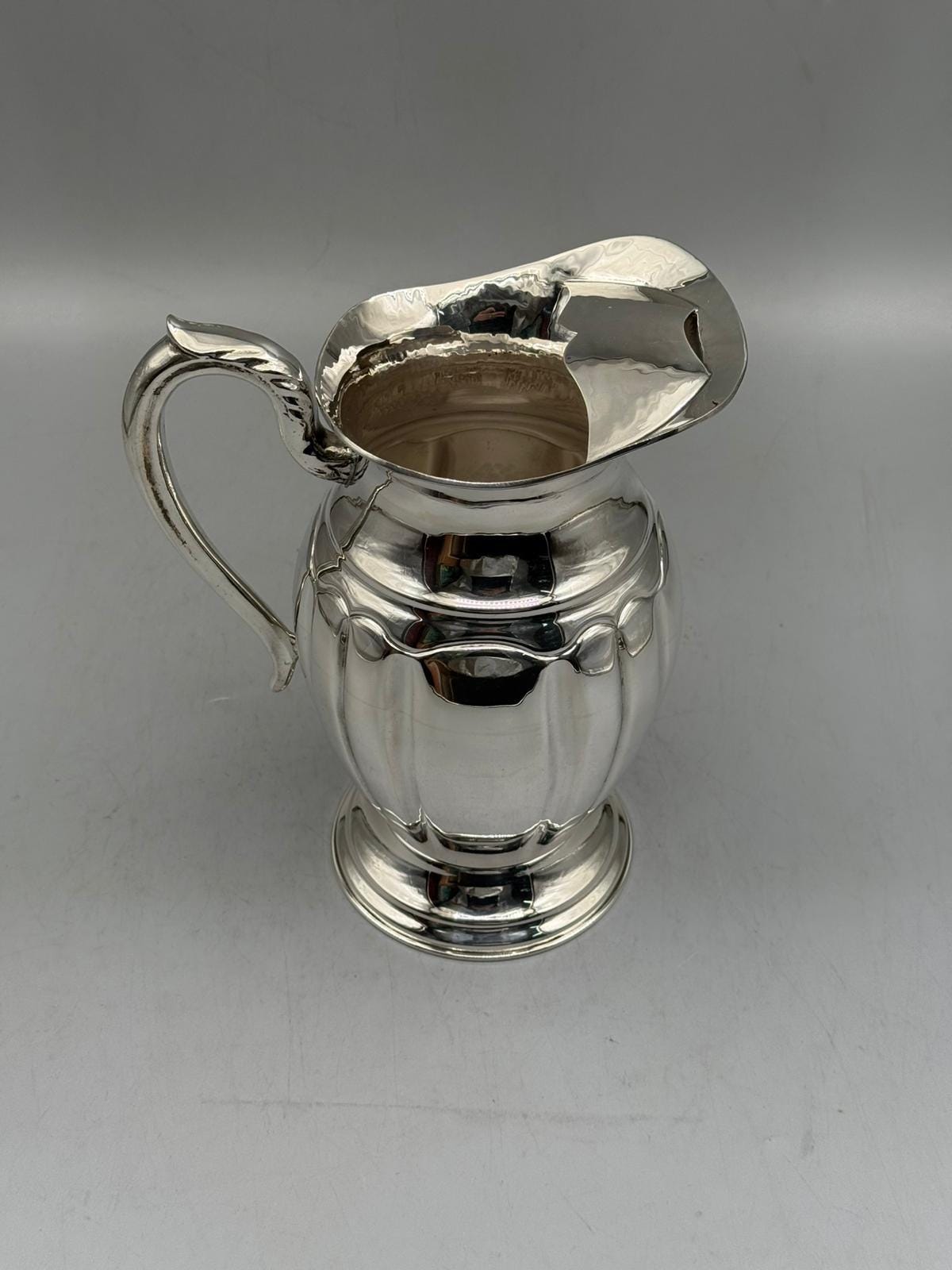 Silver-plated Ottoman pitcher with traditional relief detailing, handcrafted in Istanbul's Grand Bazaar