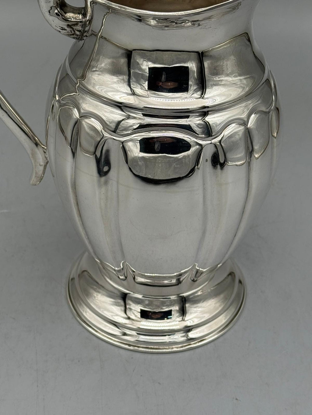 Silver-plated Ottoman pitcher with traditional relief detailing, handcrafted in Istanbul's Grand Bazaar
