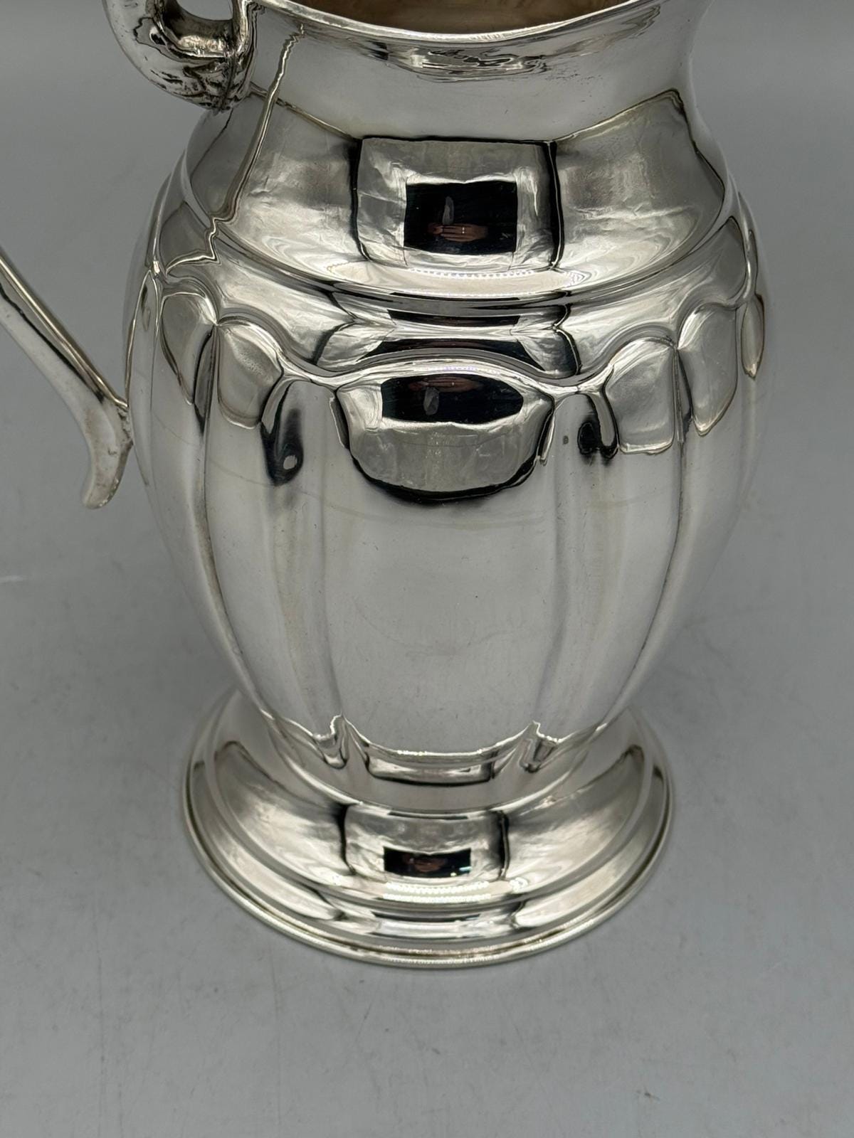 Silver-plated Ottoman pitcher with traditional relief detailing, handcrafted in Istanbul's Grand Bazaar