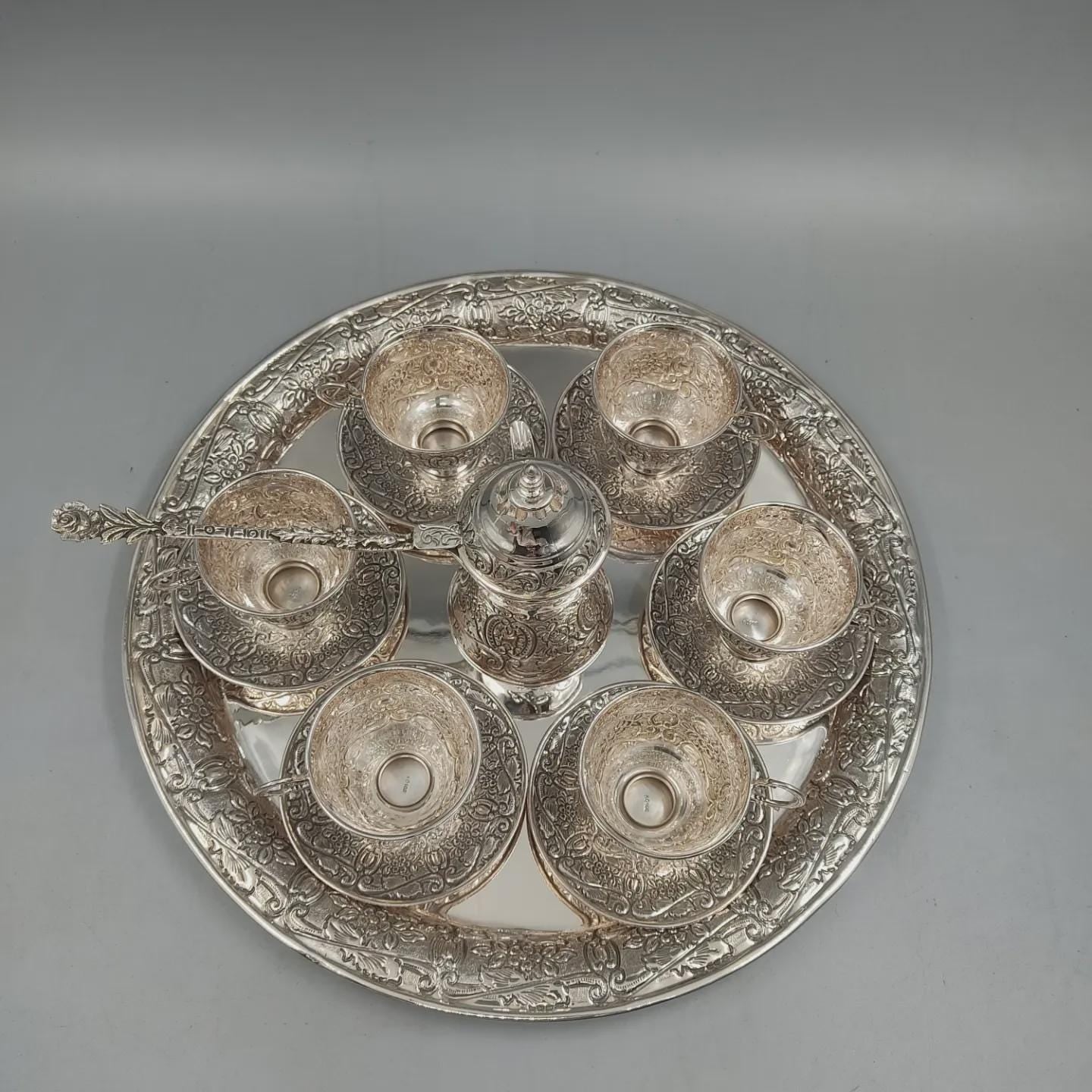Solid 925 sterling silver Turkish coffee service for six with hand-engraved floral and scroll motifs, handcrafted in Istanbul's Grand Bazaar