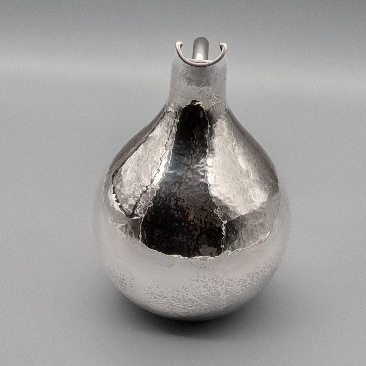 Silver-plated ceremonial ewer with elongated spout, handcrafted in Istanbul's Grand Bazaar